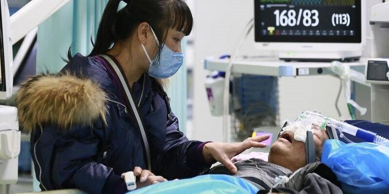 Jelang Pertemuan dengan WHO, China Kerdilkan Tingkat Keparahan Covid-19
